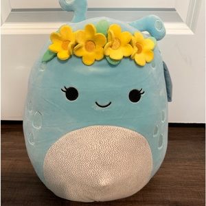 Squishmallows 11” NATNAT Blue Alien Plush with Yellow Flower Crown